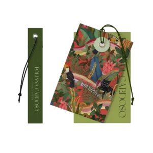 Custom apparel hang tag set with printed artwork, branded clothing tag, reinforced hole, and string, designed for fashion branding, garment labeling, and premium product presentation.