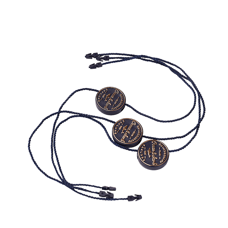 Array of custom hang strings in various colors and materials, ideal for securing hang tags with a stylish touch