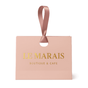 Luxury jewelry paper bag with a unique handle design, ideal for upscale retail packaging and enhancing brand presentation