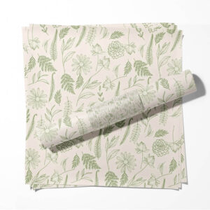 Printed tissue paper wrapping a folded garment inside a box, enhancing unboxing experience