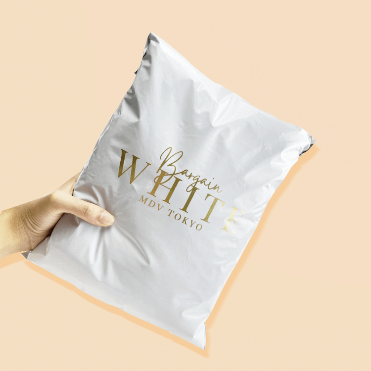 Poly mailer courier bag packaging a folded garment, ideal for low-cost clothing shipping