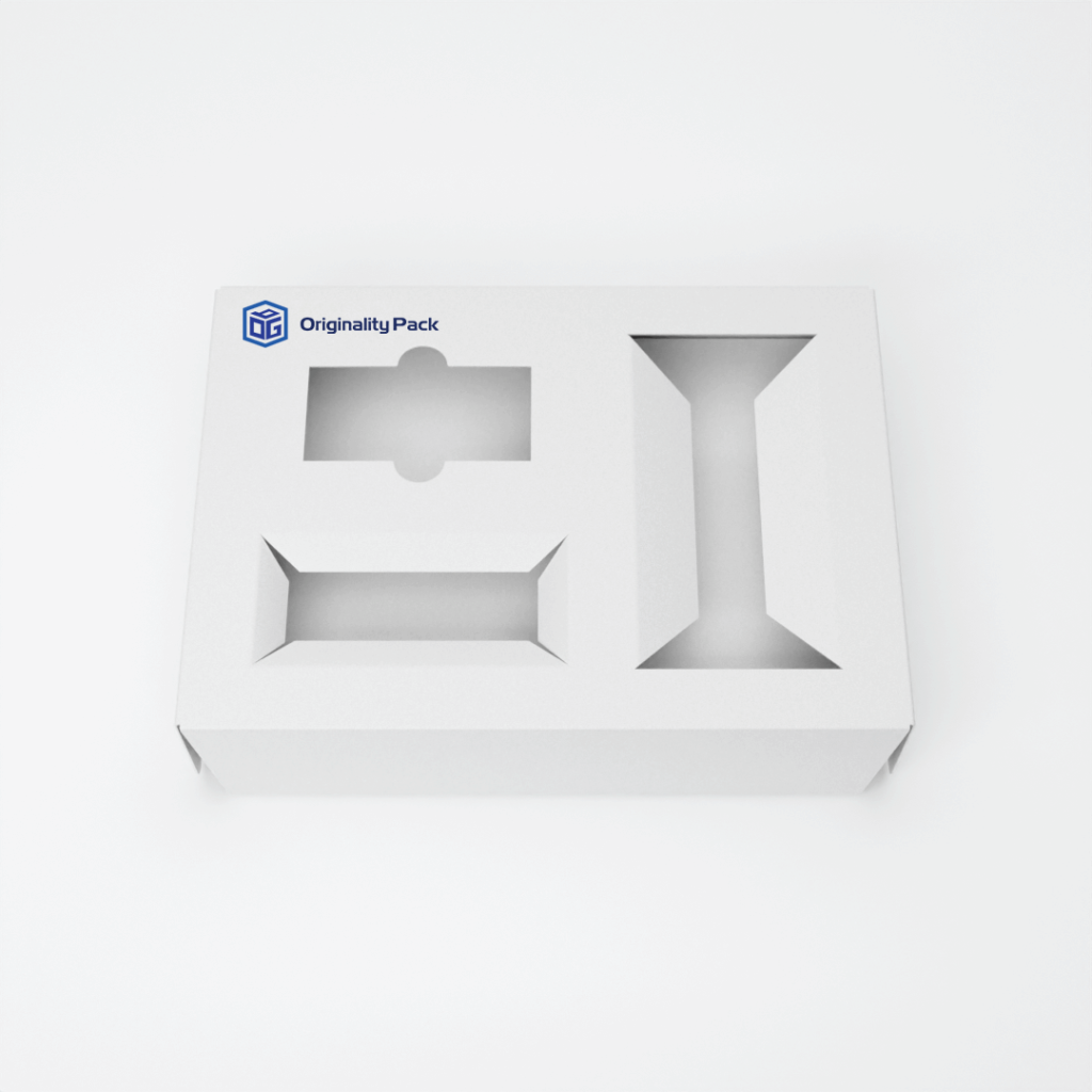 White cardboard insert with custom die-cut shapes designed for holding candle and accessory items securely.