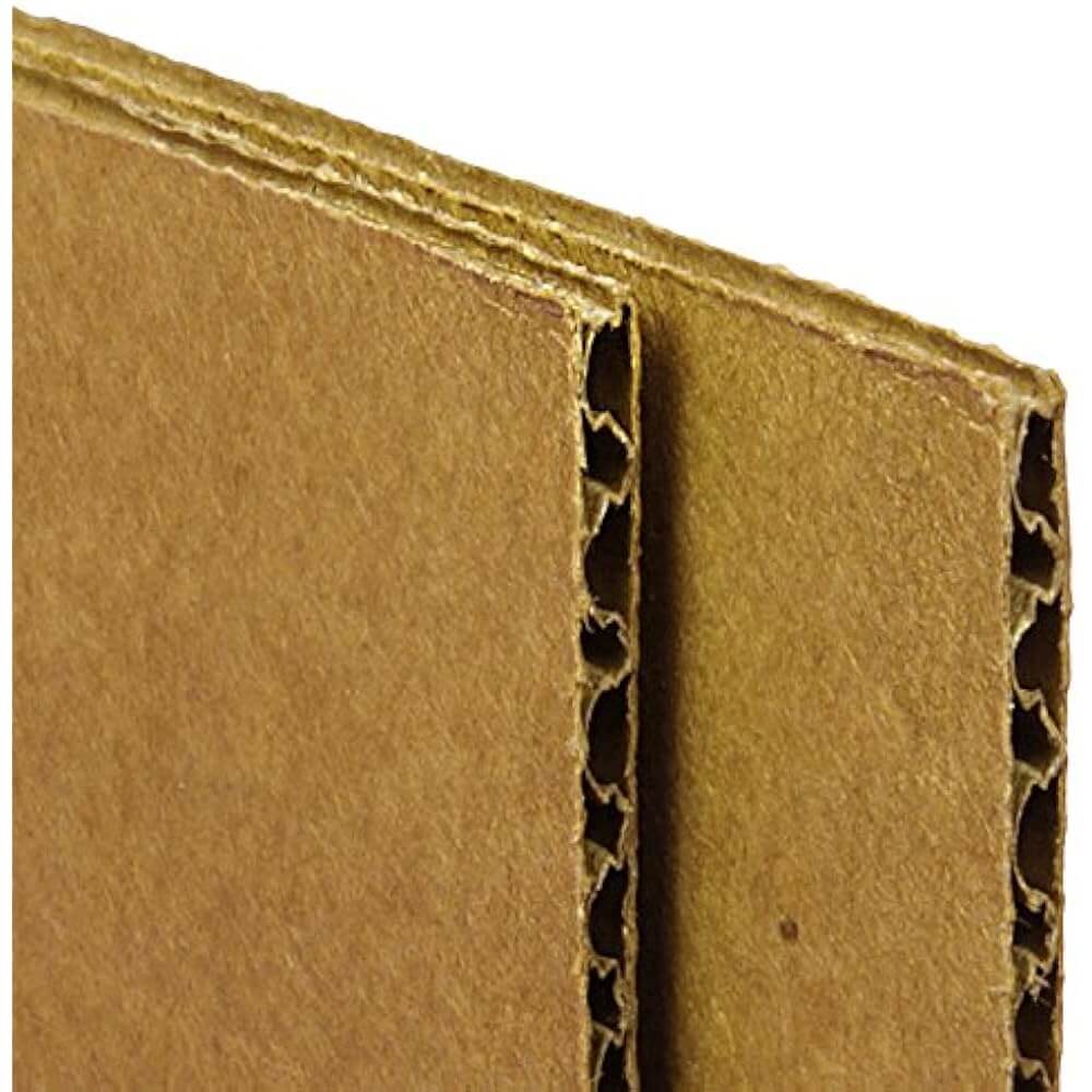 Close-up view of double-wall corrugated cardboard insert, used for protecting candle containers during shipping.