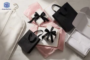 Luxury clothing packaging with rigid boxes, gift bags, and tissue paper designed for premium fashion brand unboxing experience