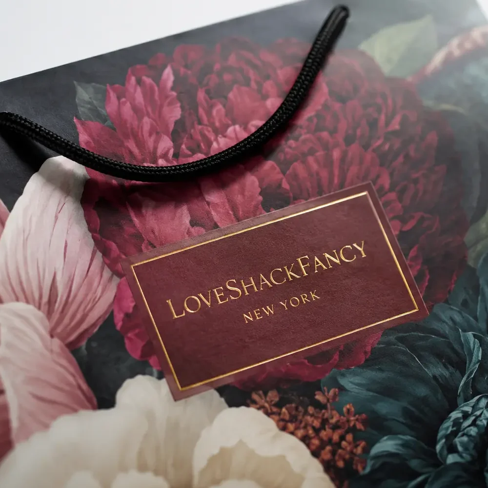 Close-up of a luxury paper bag with full CMYK printing, Pantone color matching, and logo printing to keep brand identity consistent across custom packaging.