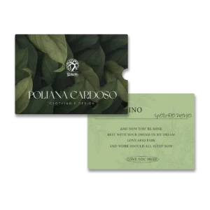 Custom thank you card with holder for apparel packaging, featuring a branded printed card, matching paper sleeve, botanical artwork, and premium unboxing presentation for clothing brands.